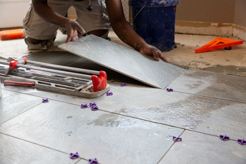 Professional Tile Installer at Work